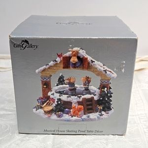 Musical house skating pond table decor. In orginal box. Gift Gallery.